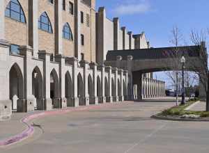 The side entrance to the First Presbyterian Church with a canopy over the door that cars can drive under. 709 South Boston Avenue, Tulsa Oklahoma 74119.