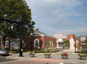 The current site of the Noah Webster Memorial Library, 20 S. Main St. in West Hartford, Connecticut, with Korczak Ziółkowski's statue of Noah Webster