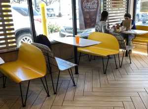 They remodeled a small McDonalds in a strip center by the financial district and took out most of the seating.