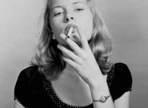 Local call number: JJS1120
Title: "Cigarette girl"
Date: April 5, 1947
Accompanying note: "Model posing for painting by Ben Stahl - 'Lucky Strike' ad."
Physical descrip: 1 photonegative - b&amp;w - 5 x 4 in.
Series Title:
