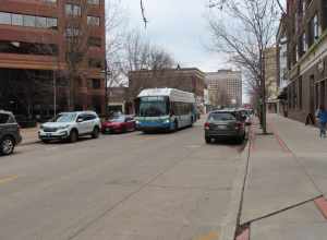 Quad Cities MetroLINK 1602, a 2016 New Flyer XN40, operates Route 30 on 5th Ave in Moline, Illinois