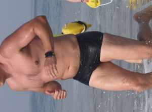 A man wearing a black Nike swim trunk exits the water after swimming the Second Annual Redondo Beach Open Water Swim held on Sunday, July 14, 2019.

VFJ_0308_cr