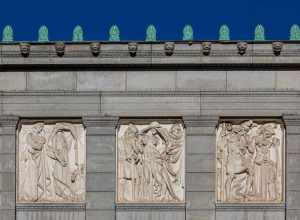 Deborah Cook Sayles Public Library. The six bas-reliefs above the library windows depict scenes from literature and mythology.