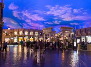 Fountain of the Gods at Caesars Palace (Las Vegas) with stores of Louis Vuitton, Moncler, Giorgio Armani, Gucci, and Salvatore Ferragamo.
