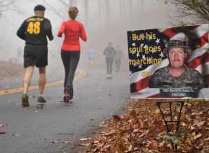 KENNESAW NATIONAL BATTLEFIELD, Kennesaw, Ga, November 23, 2013 – Runners pass a commemorative picture of Staff Sgt. David R. Jones Sr., KIA 2005 in Iraq. Georgia Army National Guard photo by Captain William Carraway / Released.