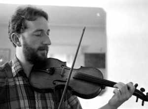Local call number: FA1612
Title: James Kelly playing the Irish fiddle: Miami, Florida
Date: 1989
Photographer: http://www.floridamemory.com/solr-search/results/?q=collection:%22Florida Photographic Collection" AND photographer:"Saltzman, Riki,