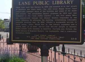 Ohio Historical Marker 37-9, describing the history of the Lane Public Library, including its historical struggles and recent expansion.