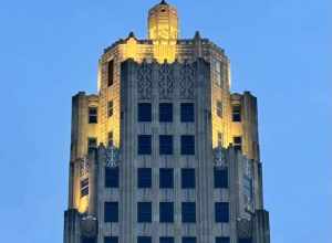 Zoomed in and cropped, showing details of the top of the Lincoln Bank Tower in Fort Wayne, Indiana