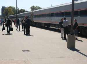 Passengers board and unboard the Lincoln Service Amtrak train bound for St. Louis.