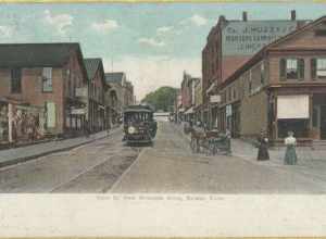 Undivided back postcard of Main Street at Riverside Street in Bristol, with a Bristol and Plainville Tramway streetcar