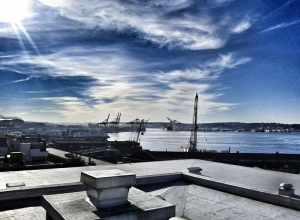 Looking roughly south by Pike Place Market toward Elliott Bay and Harbor Island in Seattle, Washington.
