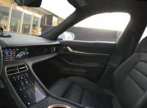 inside view of a taycan turbo with black/chalk interior