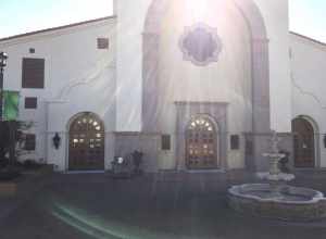 This photo of Saint Joseph Husband of Mary Catholic Church in Las Vegas Nevada shows the exterior along with a portion of the plaza. There is a fountain. There are other features that are not in the photo.This photo has different angle and lighting