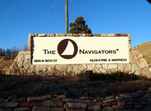 Sign outside of The Navigators Glen Eyrie castle and conference center in Colorado Springs.