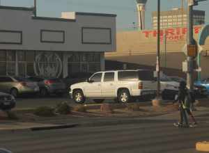 A white ninth-generation Chevrolet Suburban parked at Tymer Center in Las Vegas, Nevada.