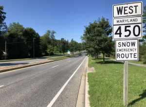 View west along Maryland State Route 450 (Annapolis Road) just west of Millstream Drive/Stonybrook Drive in Bowie, Prince George's County, Maryland