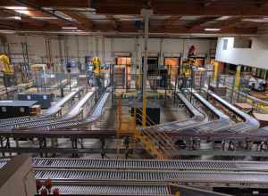 Conveyor belts at the Jelly Belly factory used to move boxes.