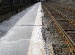 The platform edge crumbling at Newtonville station in March 2013