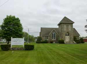 First Congregational Church, located at 785 South Main Street Raynham, Massachusetts 02767.  Church sign and northwest (front) side of building shown.