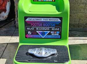 Pay machine for foot massage on the Orange County Fairgrounds, Costa Mesa, California, USA.