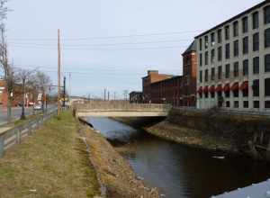 West side of Lucchesi Memorial Bridge, located at the intersection of Canal Street and Union Street in Lawrence, Massachusetts.  The bridge is Union Street's crossing over North Canal.