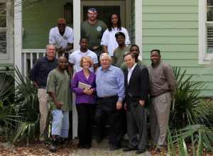 North Charleston Mayor R. Keith Summey visits with the Sustainability Institute's Energy Conservation Corps at their Green House on East Montague.

Photo by Ryan Johnson