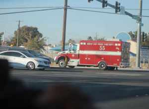 Rescue 55 of the North Las Vegas Fire Department rolling Code 3 at west Craig Road and Simmons Street.
