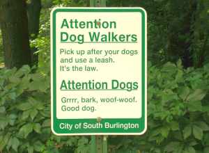 Dog walker warning sign in Red Rocks Park, South Burlington, Vermont, Aug 2006