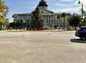 Built in 1851-1907, this Classical Revival-style building was designed by P. H. Hammarskold, John Niernsee, Frank McHenry Niernsee, Frank Pierce Milburn, and Charles Coker Wilson to serve as the state capitol building for South Carolina.  The