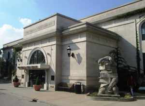 The Urbana Free Library, located at 210 West Green Street in Urbana, Illinois, was founded in 1874.  The library's current building was designed by Joseph Royer in the Classical Revival style and opened in 1918; it was expanded in 1974-75 and