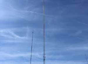 The shared transmitter for WOIO and WUAB (foreground) at the West Creek Reservation in Parma, Ohio. To the immediate left is a transmitter tower in use by: WMJI, WBNX-TV, WOCV-CD, WCDN-LD, WRAP-LD and W265BT. At far right is the transmitter for
