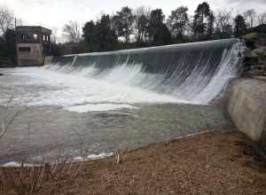 Walter Hill dam, situated on the East Fork of Stones River, with the remains of the hydroelectric station to the left.