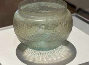 Mold-blown glass bowl by ancient Roman glassmaker Ennion, mid-1st century CE. Displayed at the Chrysler Museum of Art.
