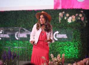 Hilda Labrada Gore speaking with attendees at the 2024 Young Women's Leadership Summit at the San Antonio Marriott Rivercenter on the River Walk in San Antonio, Texas.