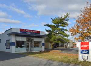 A small, one story building that houses Benjamin Moore Regal Paint Centers. 500 Hungerford Drive, Rockville, Maryland 20850.