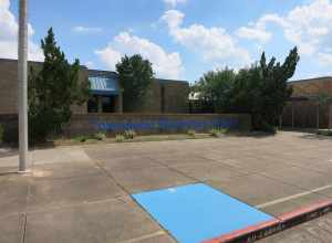 Photo shows Towne West Elementary School at 13927 Old Richmond Rd, (Sugar Land, TX address) 77498, in an unincorporated area. It is part of the Fort Bend Independent School District. View is toward the south.
