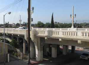 Two-image panorama of the bridge on Fourth Street in the hilly Boyle Heights neighborhood of Los Angeles, California.