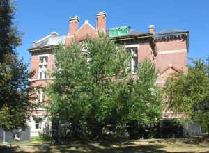 Front of Owen Hall on the campus of Indiana University in Bloomington, Indiana, United States.  Built in 1884, it is part of The Old Crescent, a group of the oldest buildings on the university's campus that is listed on the National Register of