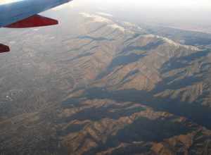 The San Bernardino Mountains are a high and rugged mountain range in Southern California in the United States. Situated north and northeast of San Bernardino and spanning two California counties, the range tops out at 11,489 feet (3,502 m) at San